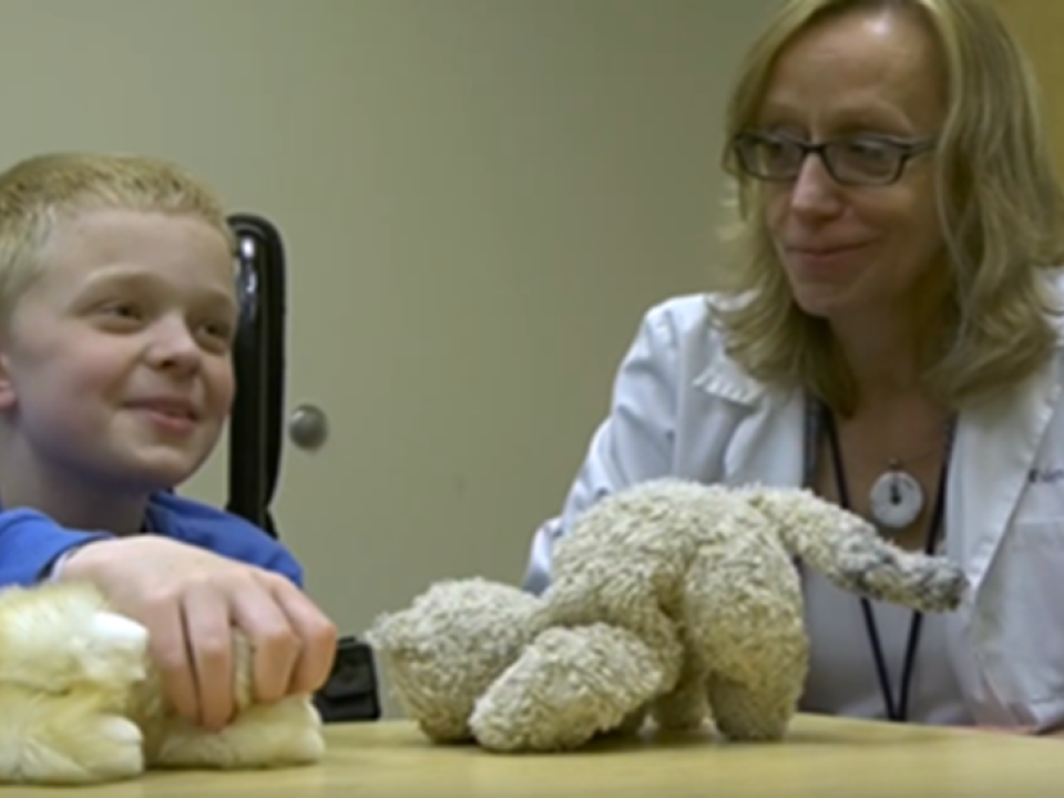 Dr. Brigitte Widemann and her patient, Travis.