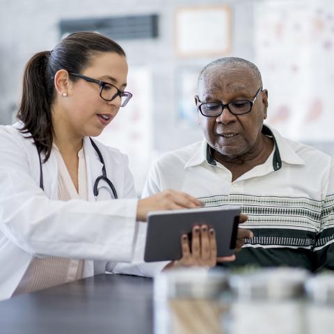 stock image of doctor with patient