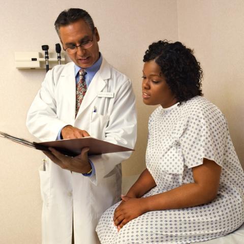 stock image of doctor with patient