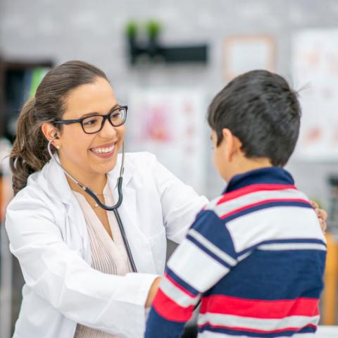 Doctor with pediatric patient