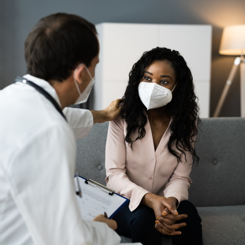 Doctor speaking with patient 