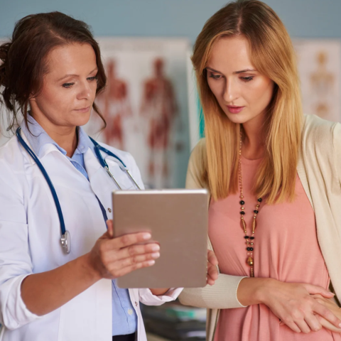 Female doctor with female patient