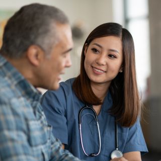 Female doctor with male patient