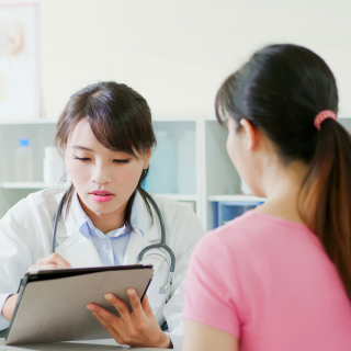 Female doctor and female patient