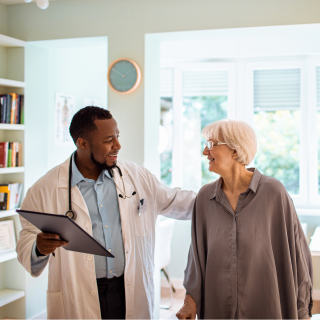 Male doctor with female patient