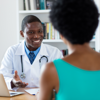 Male doctor with female patient