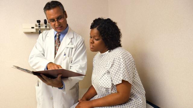 stock image of doctor with patient