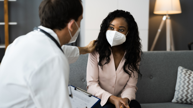 Doctor speaking with patient 