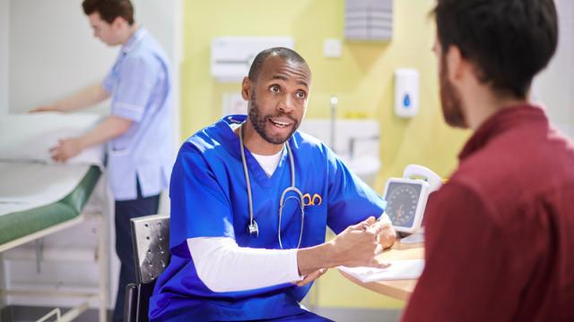 Doctor talking to patient