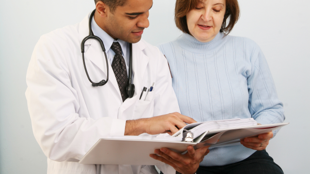 Male doctor with female patient