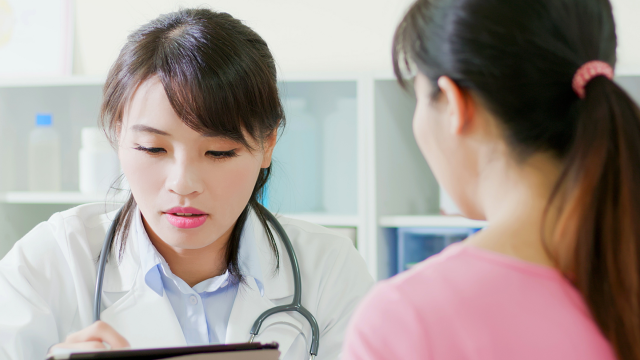 Female doctor and female patient