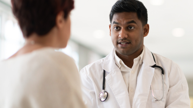 Male doctor with female patient