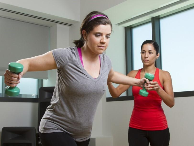 woman working with weights