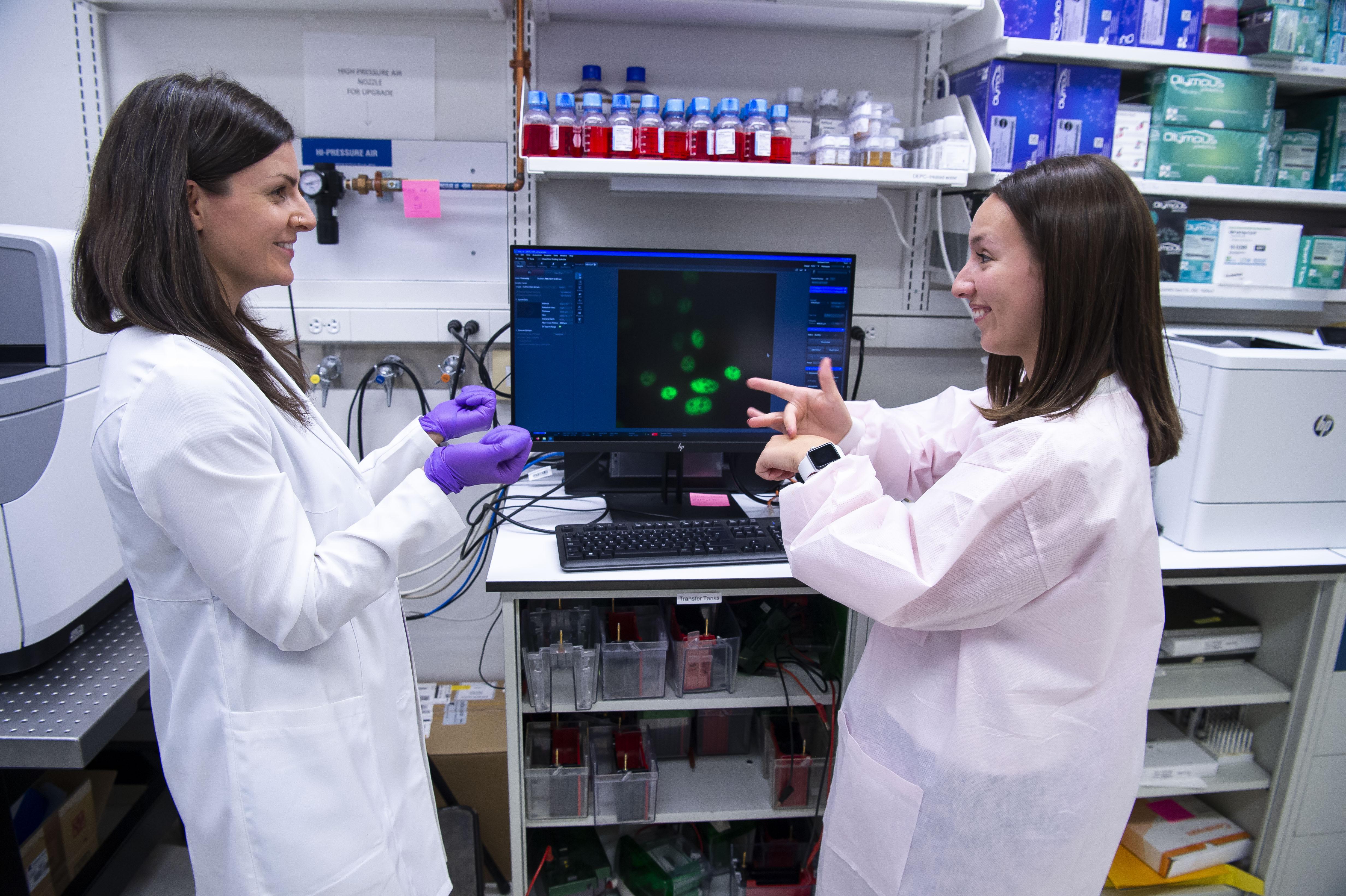 Scientists communicating using American Sign Language (ASL)