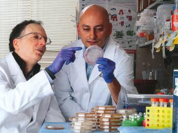 Dr. Neckers and colleague in the lab